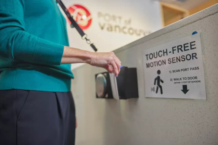 Person using touchless power operated entryways